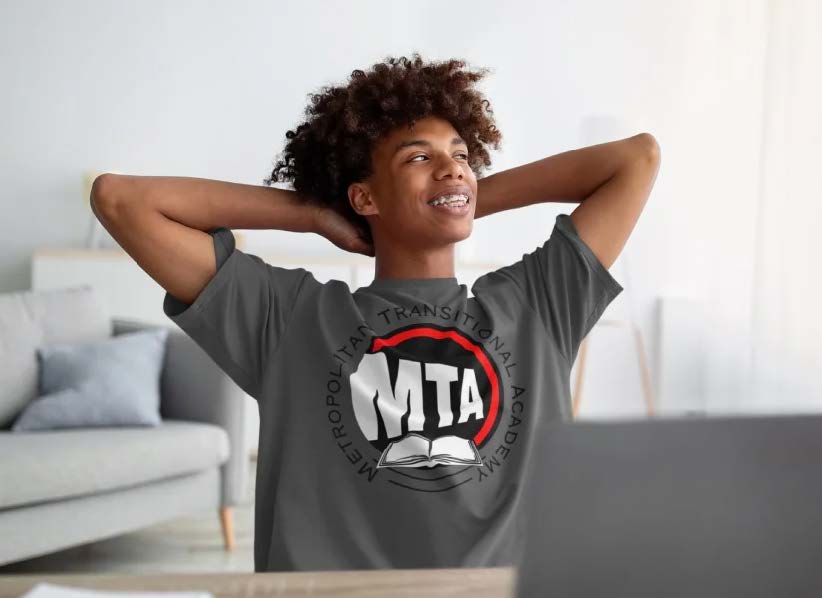 Student wearing charcoal gray MTA Metropolitan Transitional Academy t-shirt